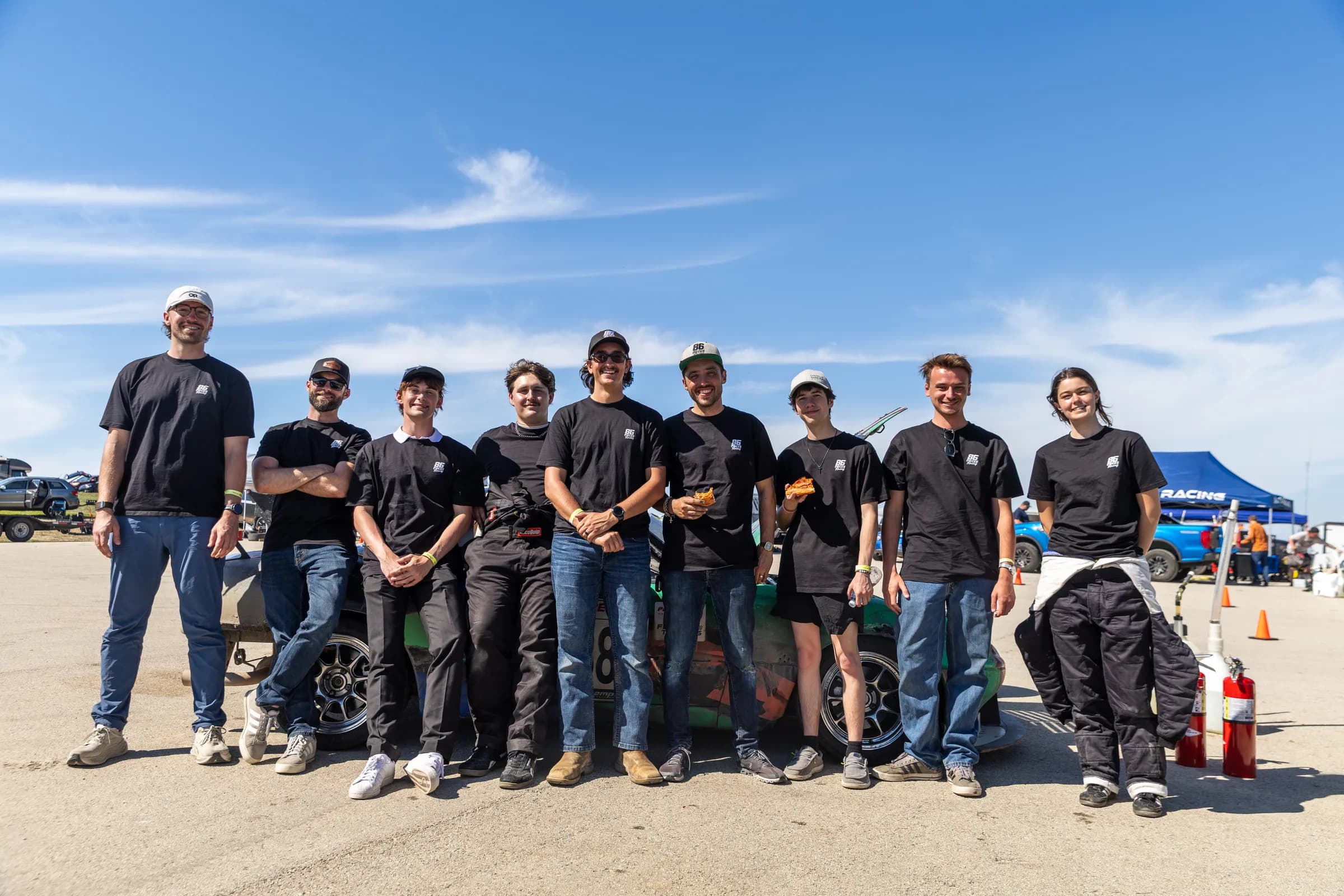 Eighty Six Pieces Racing team wearing official black team shirts